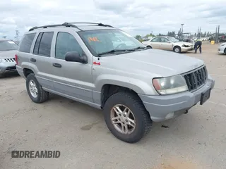2000 Jeep Grand Cherokee Laredo z VIN 1J4GW48NXYC361373, wystawiony jako IAAI lot #42121652 z przebiegiem 235 388 mil mil oraz . Historia ofert i sprzedaży dostępna na DreamBid. Obrazek 1.
