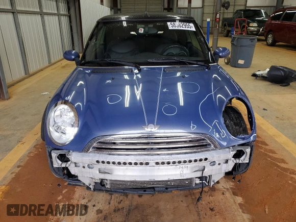 2005 MINI Convertible with VIN WMWRF33485TG10496, listed as a Copart auction lot 58582955 with 107,641 mi miles and Salvage title. Bid and sale history available at DreamBid. Image 5.