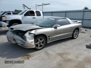 2001 Pontiac Firebird Formula z VIN 2G2FV22G912123611, wystawiony jako Copart lot #56820064 z przebiegiem 55 319 mil mil oraz Szkody całkowita. Historia ofert i sprzedaży dostępna na DreamBid. Obrazek 1.