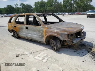 2001 Isuzu Rodeo S z VIN 4S2CK58W114309312, wystawiony jako Copart lot #56409955 z przebiegiem Nie podano mil oraz Nie do naprawy • Non repairable. Historia ofert i sprzedaży dostępna na DreamBid. Obrazek 4.