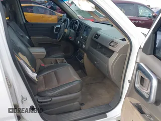2006 Honda Ridgeline RTL z VIN 2HJYK16586H519593, wystawiony jako IAAI lot #42111678 z przebiegiem 244 962 mil mil oraz . Historia ofert i sprzedaży dostępna na DreamBid. Obrazek 5.