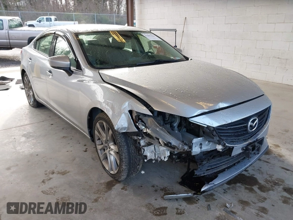 2017 Mazda Mazda6 Touring with VIN JM1GL1V50H1144637, listed as a IAAI auction lot 41849569 with 100,047 mi miles. Bid and sale history available at carsss.com. Image 1.