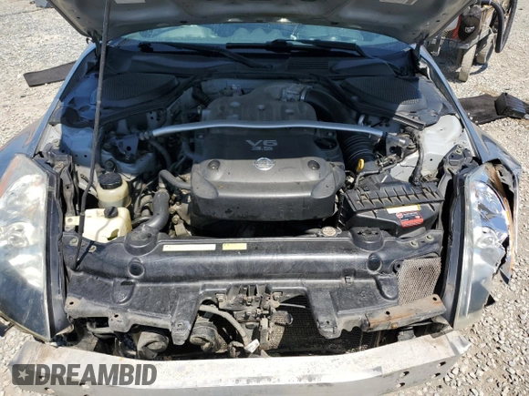 2004 Nissan 350Z Touring z VIN JN1AZ36A94T011081, wystawiony jako Copart lot #57646305 z przebiegiem 130 198 mil mil oraz Szkoda całkowita • Salvage title. Historia ofert i sprzedaży dostępna na DreamBid. Obrazek 11.