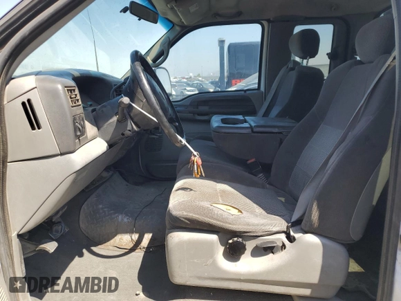 2002 Ford F-250 XL z VIN 1FTNX21F42EC44207, wystawiony jako Copart lot #60615915 z przebiegiem 320 609 mil mil oraz Szkoda całkowita • Salvage title. Historia ofert i sprzedaży dostępna na DreamBid. Obrazek 7.