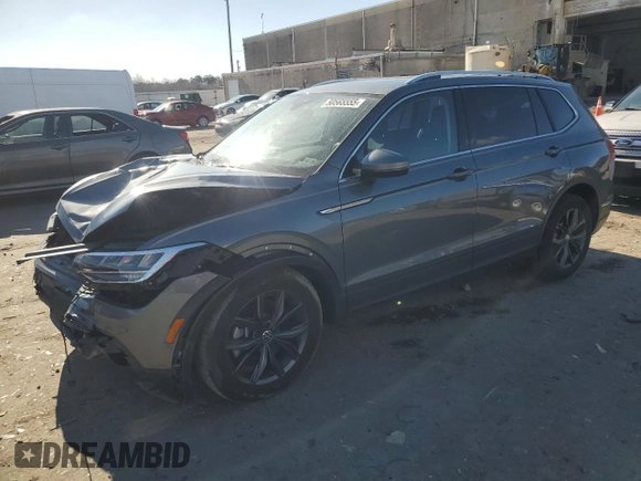 2023 Volkswagen Tiguan SE with VIN 3VVMB7AX9PM018778, listed as a Copart auction lot 50565555 with 9,758 mi miles and Salvage Title. Bid and sale history available at DreamBid. Image 1.