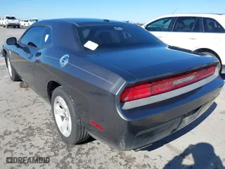 2013 Dodge Challenger Rallye Redline with VIN 2C3CDYAG8DH578929, listed as a IAAI auction lot 41479265 with 138,098 mi miles. Bid and sale history available at carsss.com. Image 3.