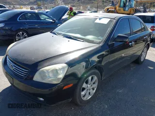 2007 Kia Optima EX with VIN KNAGE124175095989, listed as a IAAI auction lot 41637247 with 174,944 mi miles. Bid and sale history available at carsss.com. Image 2.