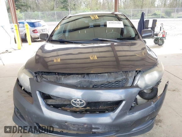 2009 Toyota Corolla with VIN 1NXBU40E29Z028660, listed as a IAAI auction lot 42025186 with 218,285 mi miles. Bid and sale history available at carsss.com. Image 6.