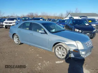2007 Cadillac STS z VIN 1G6DW677070193267, wystawiony jako IAAI lot #41849519 z przebiegiem 123 930 mil mil oraz . Historia ofert i sprzedaży dostępna na DreamBid. Obrazek 1.