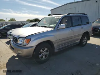 2002 Toyota Land Cruiser with VIN JTEHT05J922020391, listed as a Copart auction lot 52810615 with 309,358 mi miles and Salvage Title. Bid and sale history available at carsss.com. Image 1.