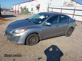 2010 Mazda 3 i SV with VIN JM1BL1SFXA1320154, listed as a IAAI auction lot 41254983 with 255,537 mi miles and . Bid and sale history available at DreamBid. Image 2.