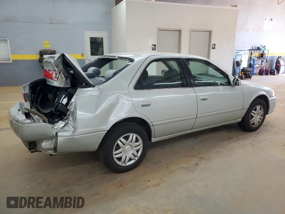 2000 Toyota Camry CE с VIN 4T1BG22KXYU002515, выставлен на аукционе Copart как лот 57896555 с пробегом 250 692 миль миль и Списание • Salvage title. История ставок и продаж доступна на DreamBid. Изображение 3.
