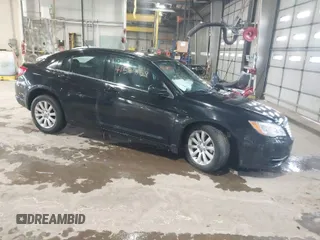 2013 Chrysler 200 Touring with VIN 1C3CCBBB6DN501373, listed as a IAAI auction lot 41587159 with 193,410 mi miles and . Bid and sale history available at DreamBid. Image 1.