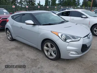 2014 Hyundai Veloster RE:FLEX z VIN KMHTC6AD6EU217282, wystawiony jako IAAI lot #42334268 z przebiegiem 68 473 mil mil oraz . Historia ofert i sprzedaży dostępna na DreamBid. Obrazek 1.
