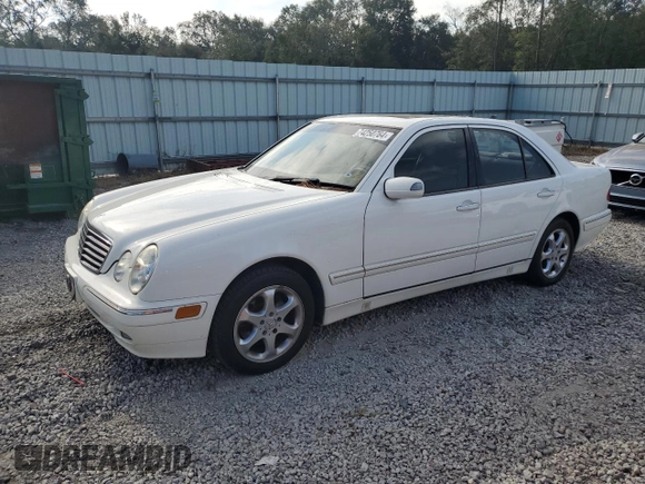 2002 Mercedes-Benz E-Class with VIN WDBJF65J12B434067, listed as a Copart auction lot 74250764 with 102,118 mi miles and Salvage Title. Bid and sale history available at carsss.com. Image 1.