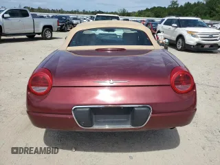 2004 Ford Thunderbird Deluxe z VIN 1FAHP60A64Y103060, wystawiony jako Copart lot #68915834 z przebiegiem 118 968 mil mil oraz Szkoda całkowita • Salvage title. Historia ofert i sprzedaży dostępna na DreamBid. Obrazek 6.
