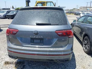 2023 Volkswagen Tiguan SE R-Line Black with VIN 3VV8B7AX3PM018096, listed as a IAAI auction lot 42174933 with 25,742 mi miles and . Bid and sale history available at DreamBid. Image 17.