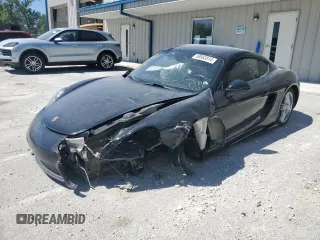 2014 Porsche Cayman с VIN WP0AA2A89EK171004, выставлен на аукционе Copart как лот 59563514 с пробегом 109 476 миль миль и На запчасти • Non repairable. История ставок и продаж доступна на DreamBid. Изображение 1.