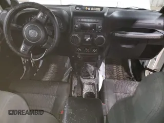 2012 Jeep Wrangler Sport z VIN 1C4AJWAG7CL256428, wystawiony jako Copart lot #66923465 z przebiegiem 36 478 mil mil oraz Szkoda całkowita • Salvage title. Historia ofert i sprzedaży dostępna na DreamBid. Obrazek 8.