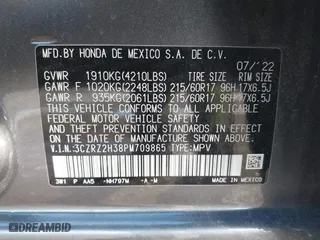 2023 Honda HR-V LX with VIN 3CZRZ2H38PM709865, listed as a IAAI auction lot 41571229 with 28,036 mi miles. Bid and sale history available at carsss.com. Image 9.