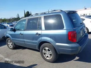 2005 Honda Pilot EX-L with VIN 2HKYF18565H534394, listed as a IAAI auction lot 41539630 with 168,384 mi miles. Bid and sale history available at carsss.com. Image 14.