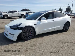 2023 Tesla Model 3 Performance z VIN 5YJ3E1EC4PF649772, wystawiony jako Copart lot #49632215 z przebiegiem 33 302 mil mil oraz Szkoda całkowita • Salvage title. Historia ofert i sprzedaży dostępna na DreamBid. Obrazek 1.