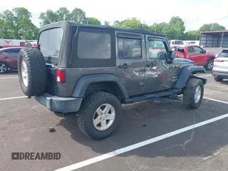 2016 Jeep Wrangler Unlimited Sport with VIN 1C4BJWDG7GL329660, listed as a IAAI auction lot 42482861 with 115,622 mi miles and . Bid and sale history available at DreamBid. Image 4.
