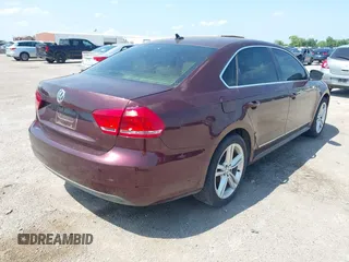 2013 Volkswagen Passat SEL Premium z VIN 1VWCN7A31DC096741, wystawiony jako IAAI lot #42412946 z przebiegiem Nie podano mil oraz . Historia ofert i sprzedaży dostępna na DreamBid. Obrazek 4.