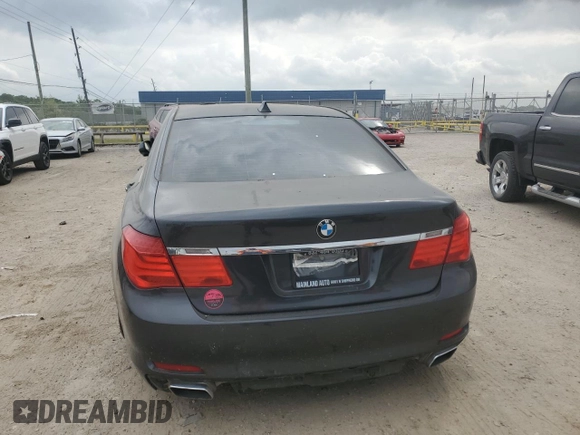 2012 BMW 7 Series 750Li with VIN WBAKB8C59CC962970, listed as a Copart auction lot 54011145 with 111,007 mi miles and Clean Title. Bid and sale history available at carsss.com. Image 6.