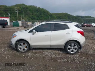 2015 Buick Encore Convenience with VIN KL4CJFSB9FB192053, listed as a IAAI auction lot 42181792 with 135,247 mi miles. Bid and sale history available at carsss.com. Image 14.