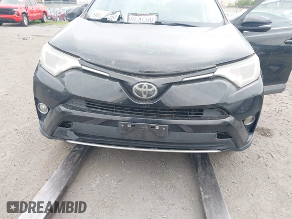 2017 Toyota RAV4 XLE with VIN 2T3WFREV1HW372889, listed as a IAAI auction lot 41895613 with 112,408 mi miles. Bid and sale history available at carsss.com. Image 6.