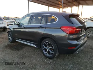 2017 BMW X1 xDrive28i with VIN WBXHT3C30H5F71865, listed as a Copart auction lot 67841122 with 75,471 mi miles. Bid and sale history available at carsss.com. Image 2.