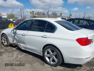 2015 BMW 3 Series 328i with VIN WBA3C1C5XFK117788, listed as a IAAI auction lot 41752178 with 154,030 mi miles and . Bid and sale history available at carsss.com. Image 14.