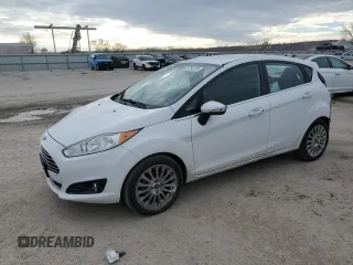 2014 Ford Fiesta Titanium z VIN 3FADP4FJ6EM103311, wystawiony jako Copart lot #49784375 z przebiegiem 137 117 mil mil oraz Szkoda całkowita • Salvage title. Historia ofert i sprzedaży dostępna na DreamBid. Obrazek 1.