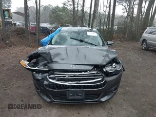 2016 Ford Fusion SE Hybrid with VIN 3FA6P0LU2GR388787, listed as a IAAI auction lot 41733661 with 86,078 mi miles and . Bid and sale history available at DreamBid. Image 12.