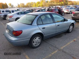 2002 Saturn SL z VIN 1G8ZS528327278417, wystawiony jako IAAI lot #40611406 z przebiegiem 227 283 mil mil oraz . Historia ofert i sprzedaży dostępna na DreamBid. Obrazek 4.