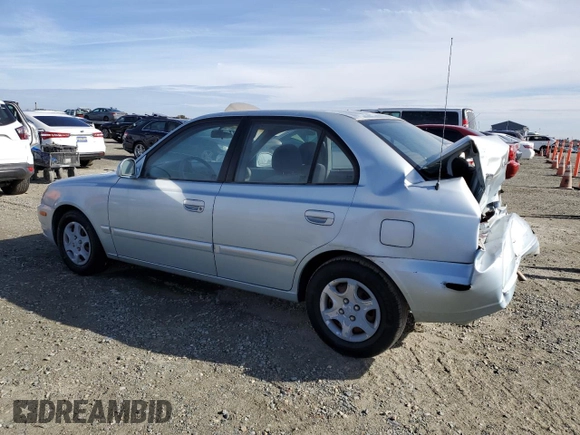 2003 Hyundai Accent GL with VIN KMHCG45C13U429952, listed as a Copart auction lot 77835874 with 120,554 mi miles and Salvage Title. Bid and sale history available at carsss.com. Image 2.