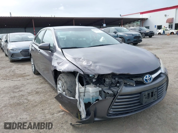 2017 Toyota Camry Hybrid LE with VIN 4T1BD1FK9HU216117, listed as a IAAI auction lot 41710989 with 99,595 mi miles. Bid and sale history available at carsss.com. Image 6.