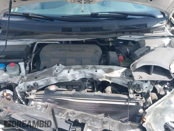 2016 Honda Odyssey SE with VIN 5FNRL5H33GB043303, listed as a IAAI auction lot 42215233 with 67,097 mi miles and . Bid and sale history available at DreamBid. Image 10.