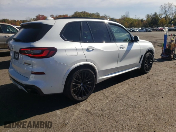 2020 BMW X5 M50i with VIN 5UXJU4C06L9C45320, listed as a Copart auction lot 74911604 with 78,465 mi miles and Salvage Title. Bid and sale history available at carsss.com. Image 3.