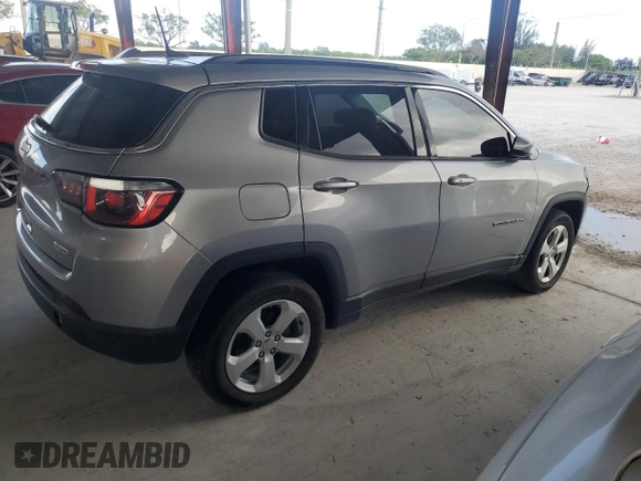 2019 Jeep Compass Altitude with VIN 3C4NJDBB3KT599863, listed as a Copart auction lot 57561965 with 72,482 mi miles and Salvage title. Bid and sale history available at DreamBid. Image 3.