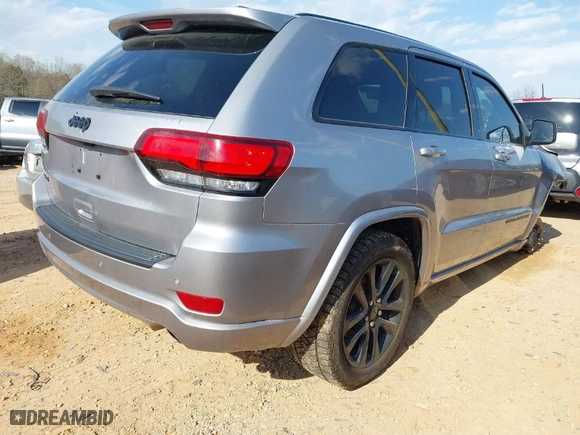 2021 Jeep Grand Cherokee Laredo X with VIN 1C4RJFAG7MC647244, listed as a IAAI auction lot 41886548 with 87,342 mi miles. Bid and sale history available at carsss.com. Image 4.