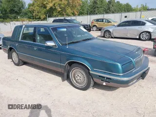 1993 Chrysler New Yorker z VIN 1C3XV66L4PD136546, wystawiony jako IAAI lot #41320265 z przebiegiem 146 953 mil mil oraz . Historia ofert i sprzedaży dostępna na DreamBid. Obrazek 1.