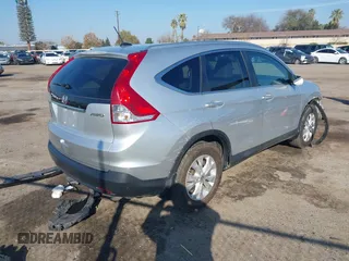 2013 Honda CR-V EX-L z VIN 2HKRM4H79DH658655, wystawiony jako IAAI lot #41243547 z przebiegiem 87 334 mil mil oraz . Historia ofert i sprzedaży dostępna na DreamBid. Obrazek 4.
