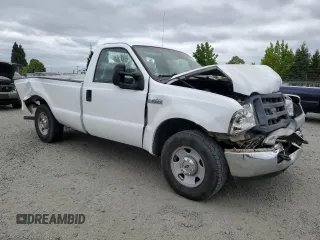 2005 Ford F-250 XL with VIN 1FTNF20595EB89821, listed as a Copart auction lot 60841825 with 133,523 mi miles and Salvage title. Bid and sale history available at DreamBid. Image 4.