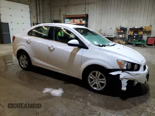 2013 Chevrolet Sonic LT with VIN 1G1JC5SB8D4164658, listed as a Copart auction lot 47059365 with 105,985 mi miles and Salvage Title. Bid and sale history available at DreamBid. Image 4.