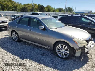 2010 Infiniti M with VIN JN1CY0AP5AM911259, listed as a Copart auction lot 74220044 with 265,925 mi miles and Salvage Title. Bid and sale history available at DreamBid. Image 4.