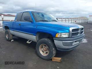 2001 Dodge 1500 with VIN 3B7HF13Z31G207397, listed as a IAAI auction lot 41977625 with 166,166 mi miles. Bid and sale history available at carsss.com. Image 1.