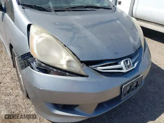 2009 Honda Fit Sport w/Navi with VIN JHMGE88619S020572, listed as a IAAI auction lot 41755126 with 202,358 mi miles. Bid and sale history available at carsss.com. Image 6.