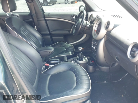 2012 MINI Countryman S z VIN WMWZC3C5XCWM26655, wystawiony jako IAAI lot #42083045 z przebiegiem 156 558 mil mil oraz . Historia ofert i sprzedaży dostępna na DreamBid. Obrazek 5.